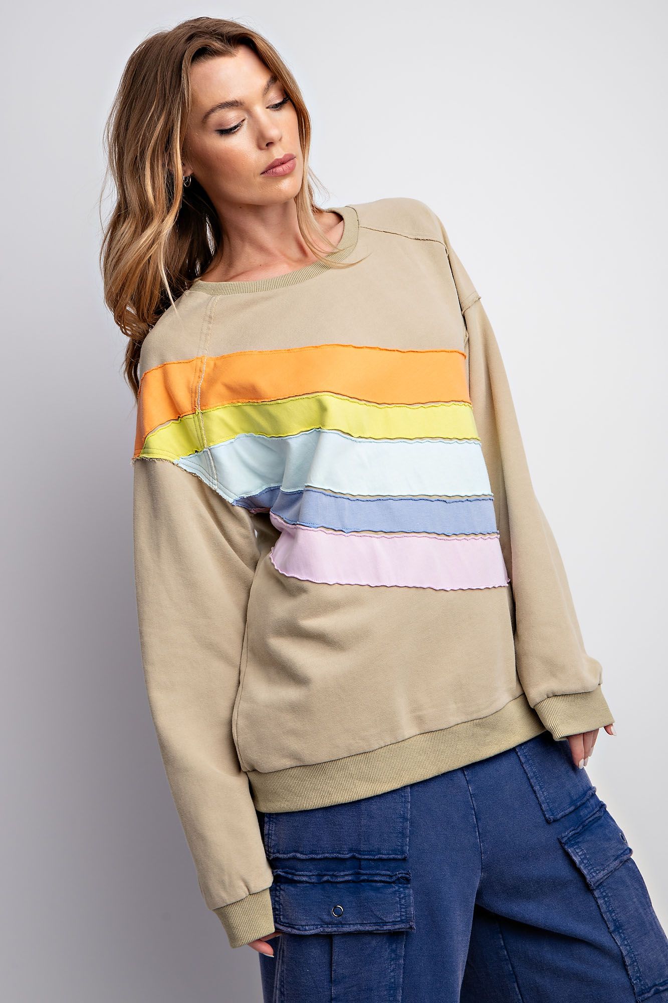 Grey sweater with 2025 rainbow stripes